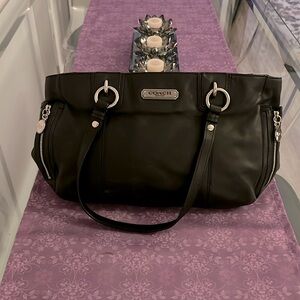 Coach Vintage Handbag. Gorgeous Black Leather with silver hardware. Perfect!